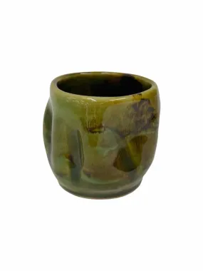 A GRN/BRN POTTERY INDENTED PLANTER