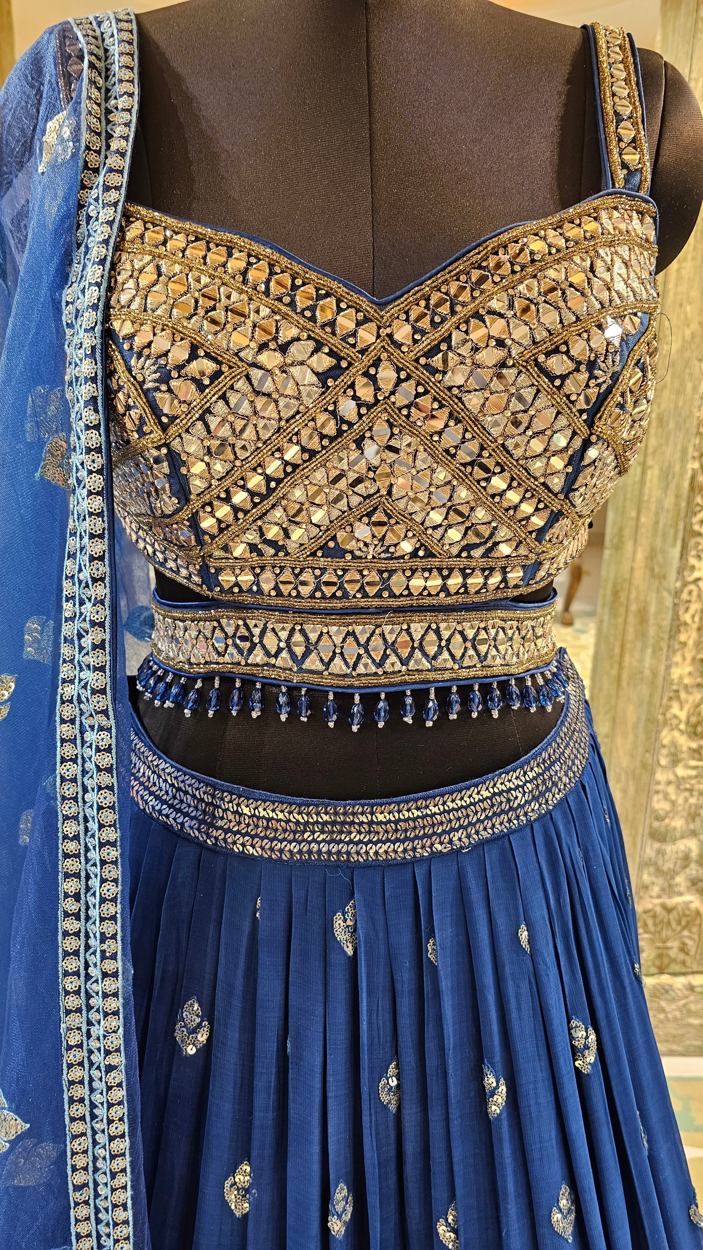 Blue Georgette Lehenga Choli With Mirror, Zari, and Sequins Work.