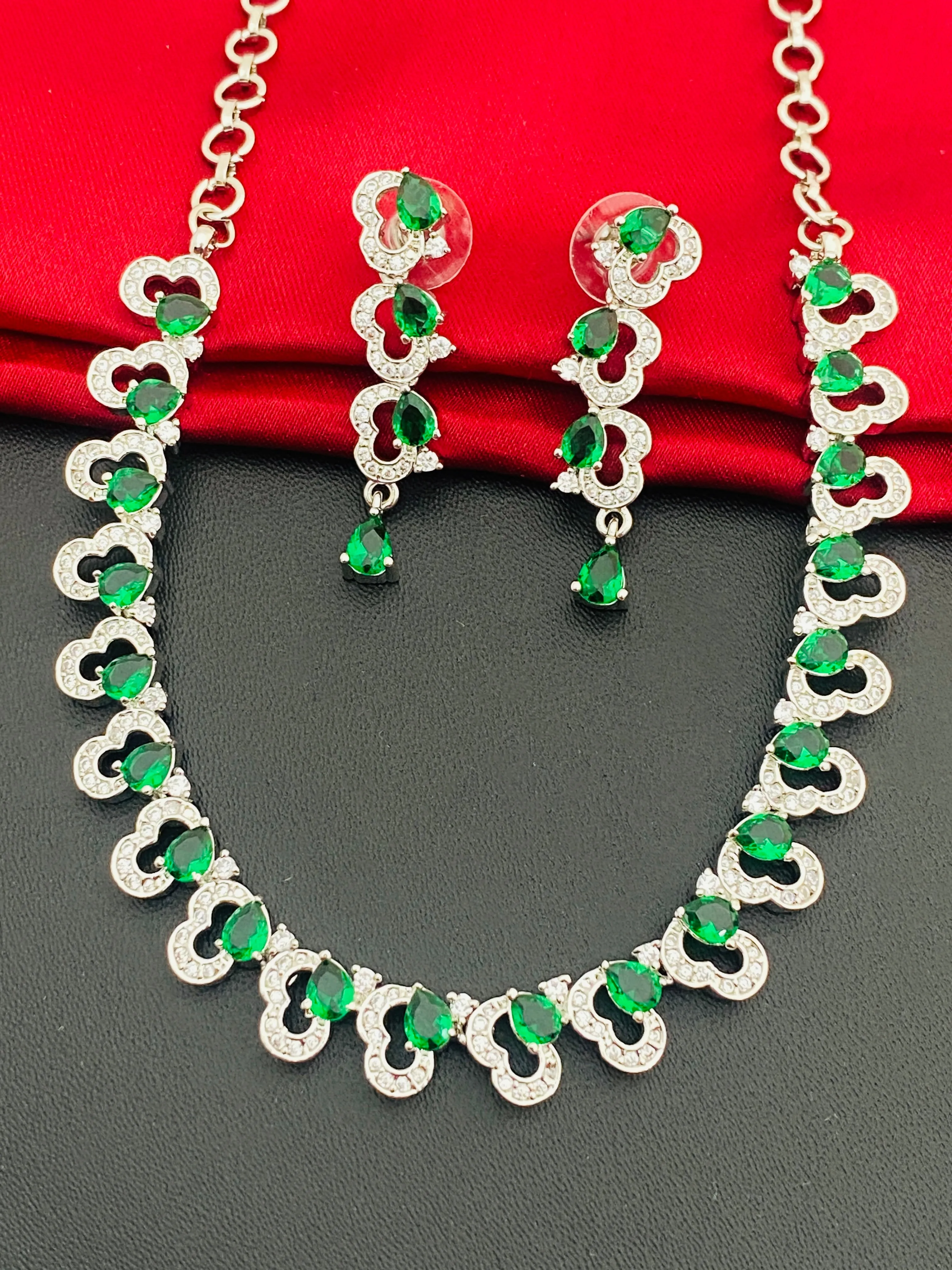 Charming Heart Designed American Diamond Necklace And Earrings With Green Color