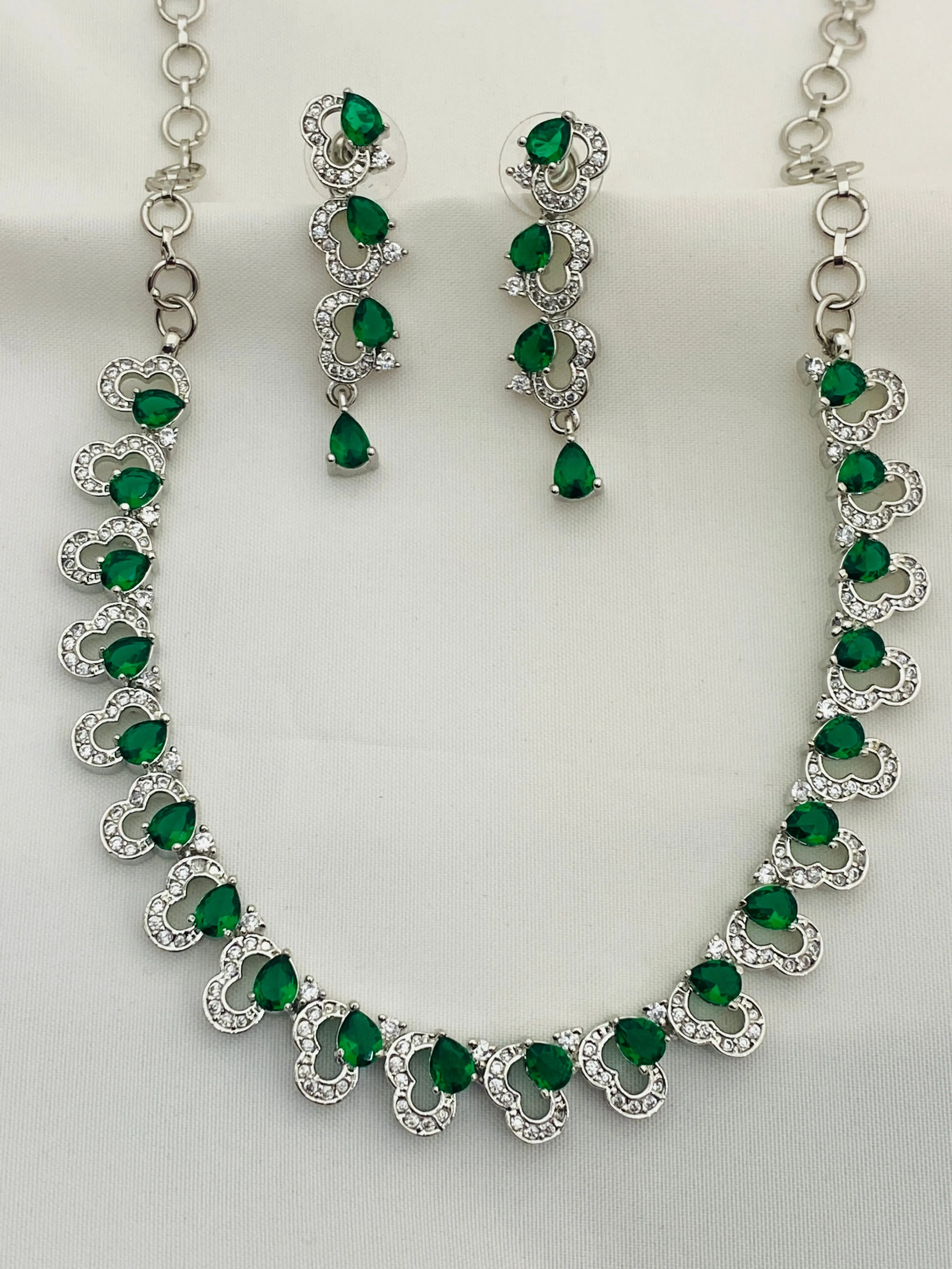 Charming Heart Designed American Diamond Necklace And Earrings With Green Color